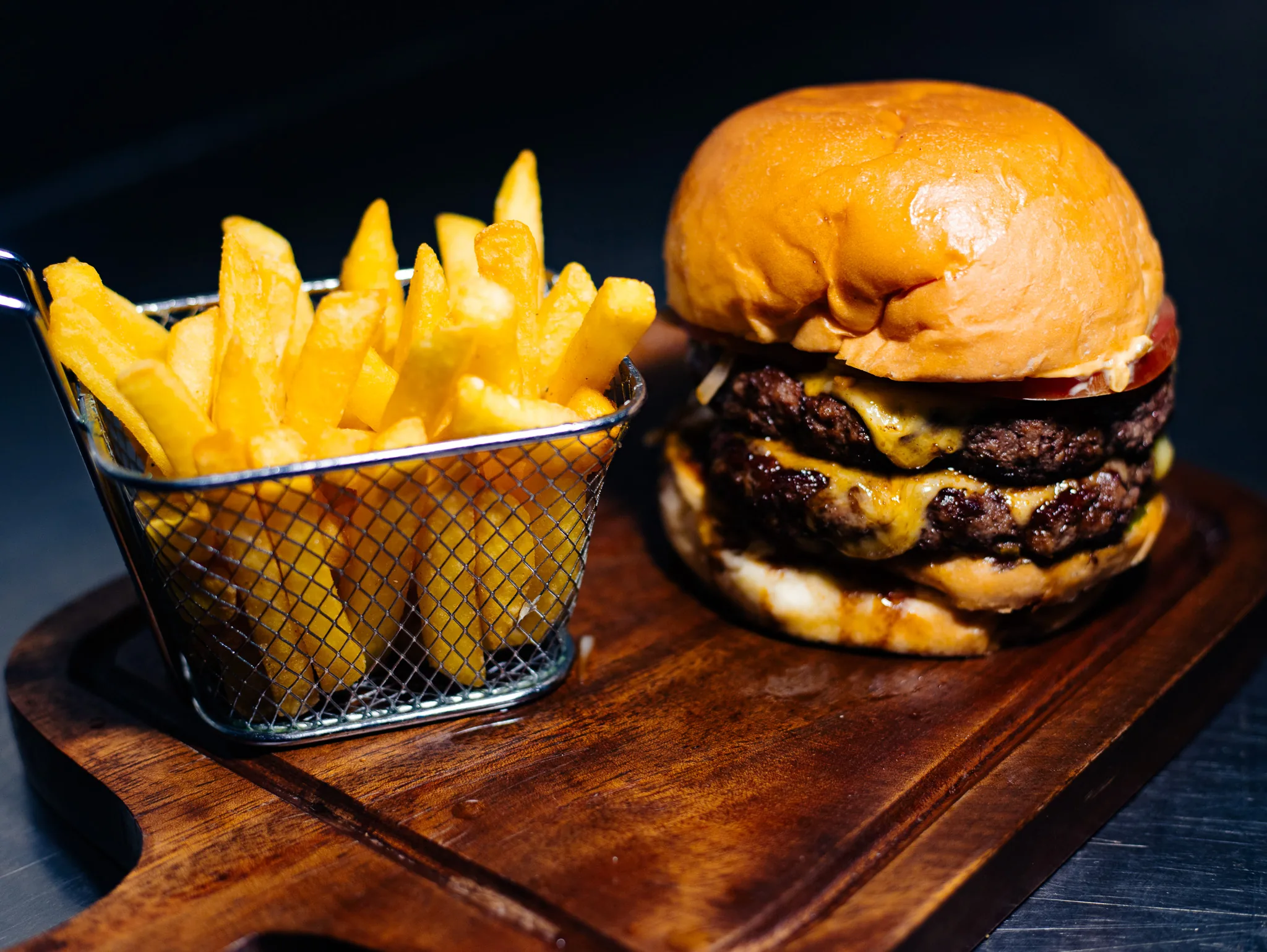 Double cheeseburger served with fries